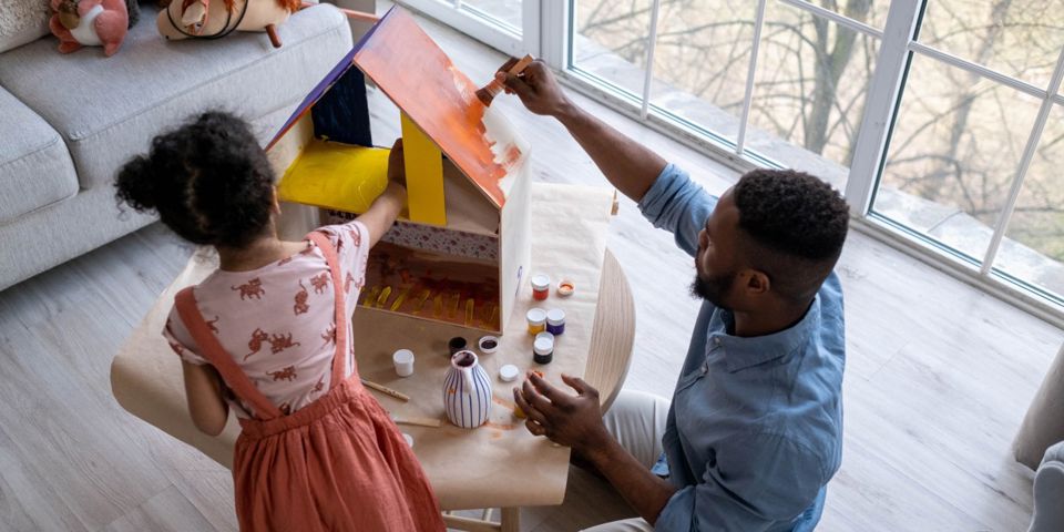 father and daughter working together