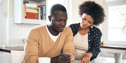 Couple going through numbers