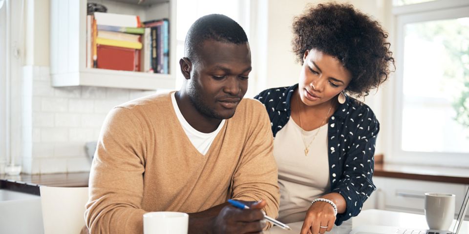 Couple going through numbers