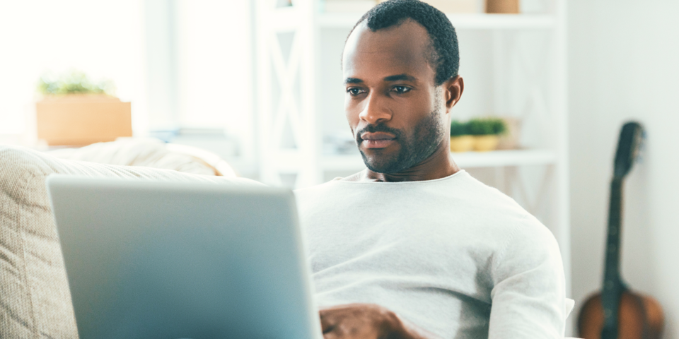 man using laptop