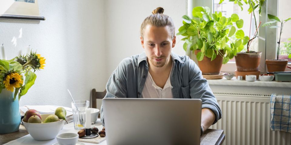 man using laptop