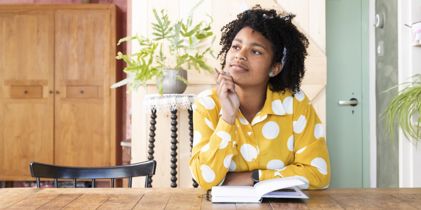 young woman pondering