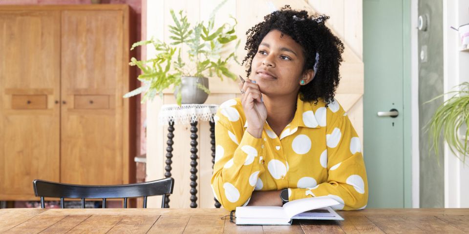 young woman pondering