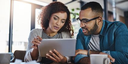 two people with tablet