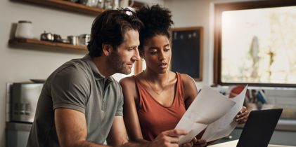 couple looking at document