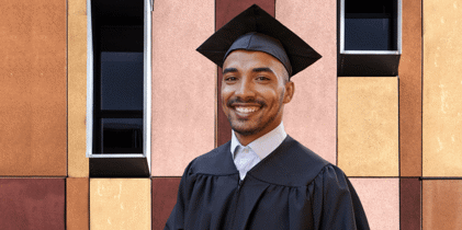 Young man in graduation gown with morterboard