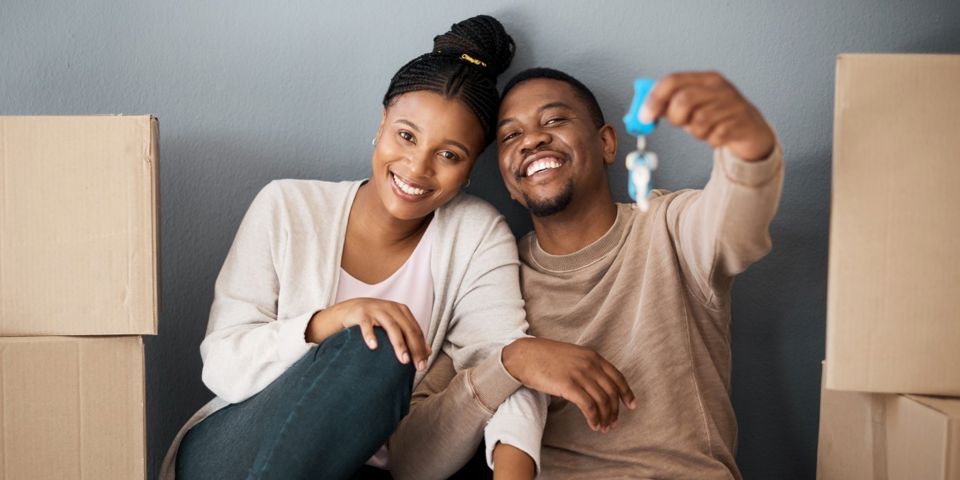 Couple sitting in their new home