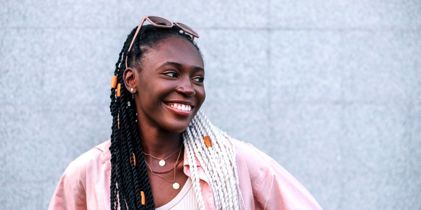 Happy African woman smiling