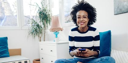 smiling woman on couch
