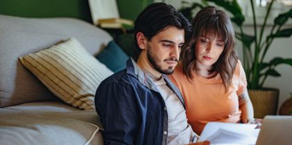 couple looking at laptop