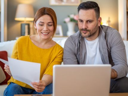 Couple looking at their finances