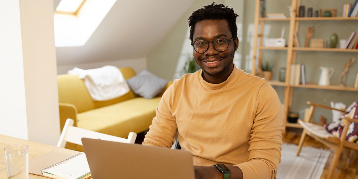 man on laptop at desk