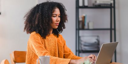 woman on laptop at home
