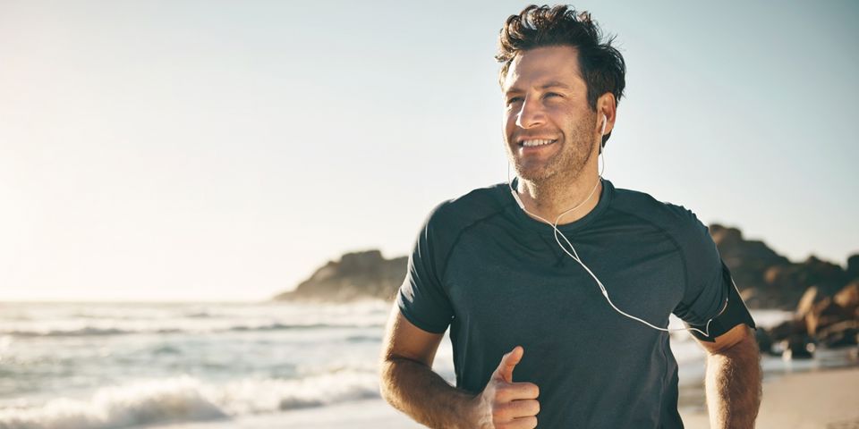 Man running on beach