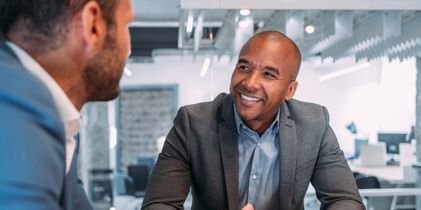 two businessmen talking