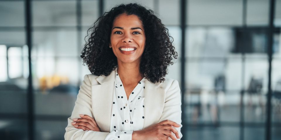 Woman standing with arms crossed