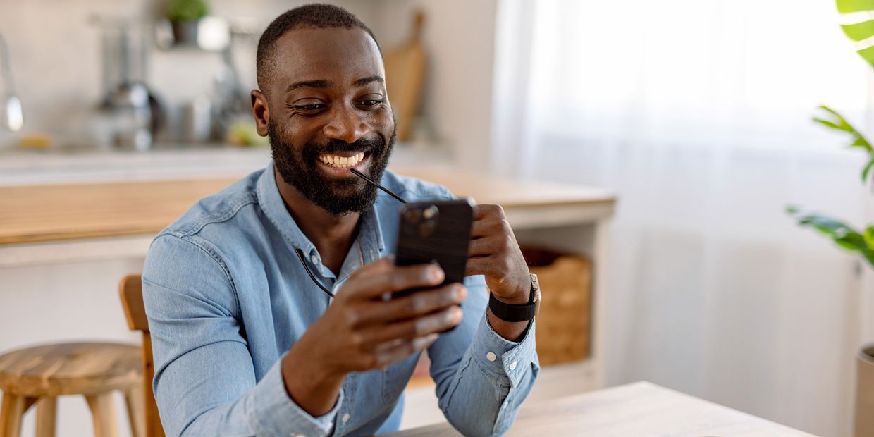 happy man on cellphone