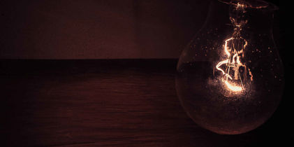 dimly lit lightbulb
