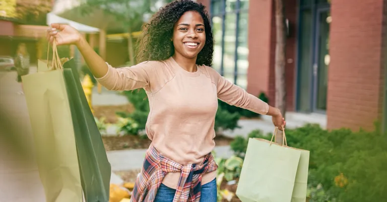 happy woman with shopping bags