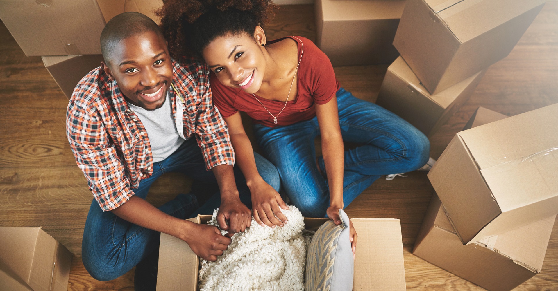 couple in new home with boxes