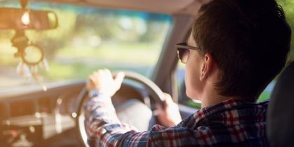 Man driving a car