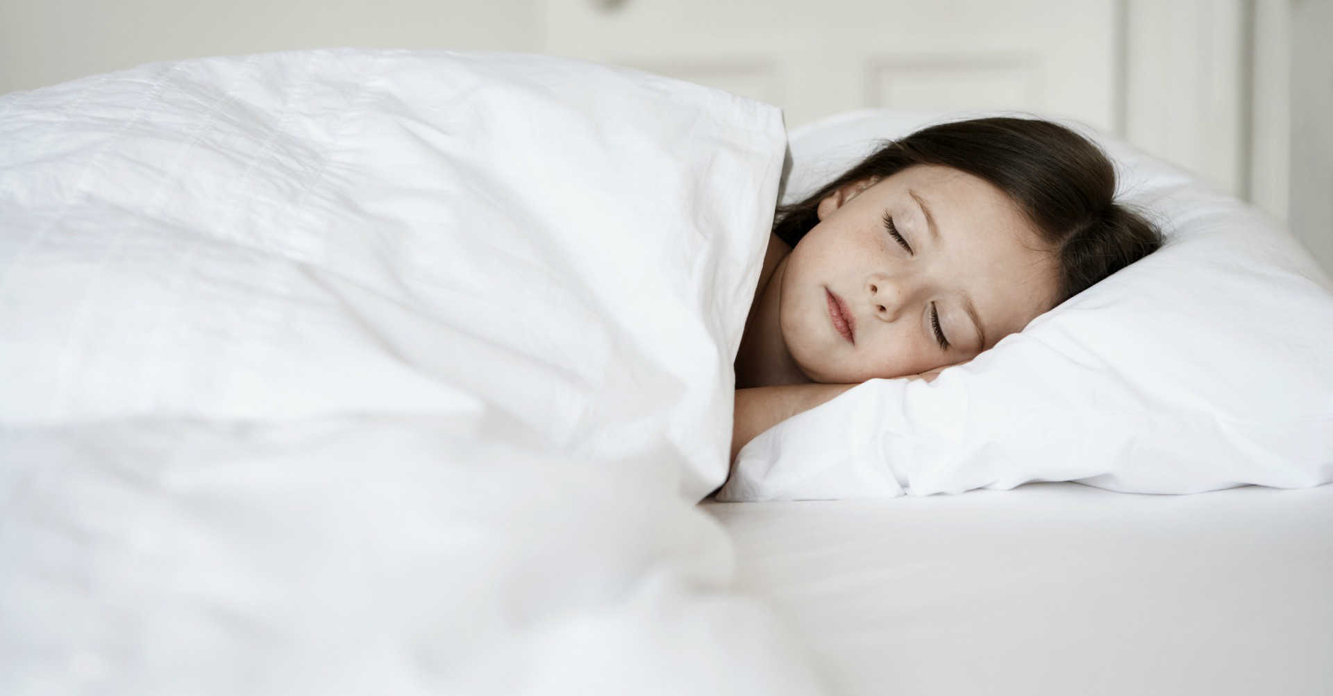 girl sleeping in bed