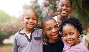 group of children posing for photo