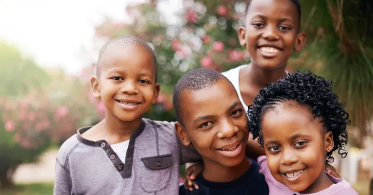 group of children posing for photo