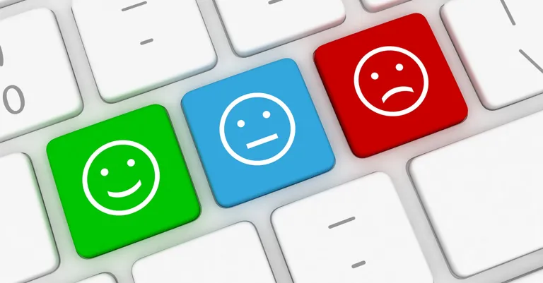 Keyboard with happy and sad face as keys