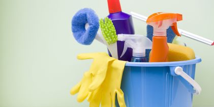 Household cleaning products in a bucket