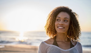 woman on beach thinking