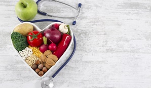 Bowl of vegetables in heat shape with stethoscope