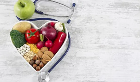 Bowl of vegetables in heat shape with stethoscope