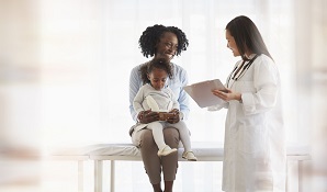 Mother with daughter at doctor