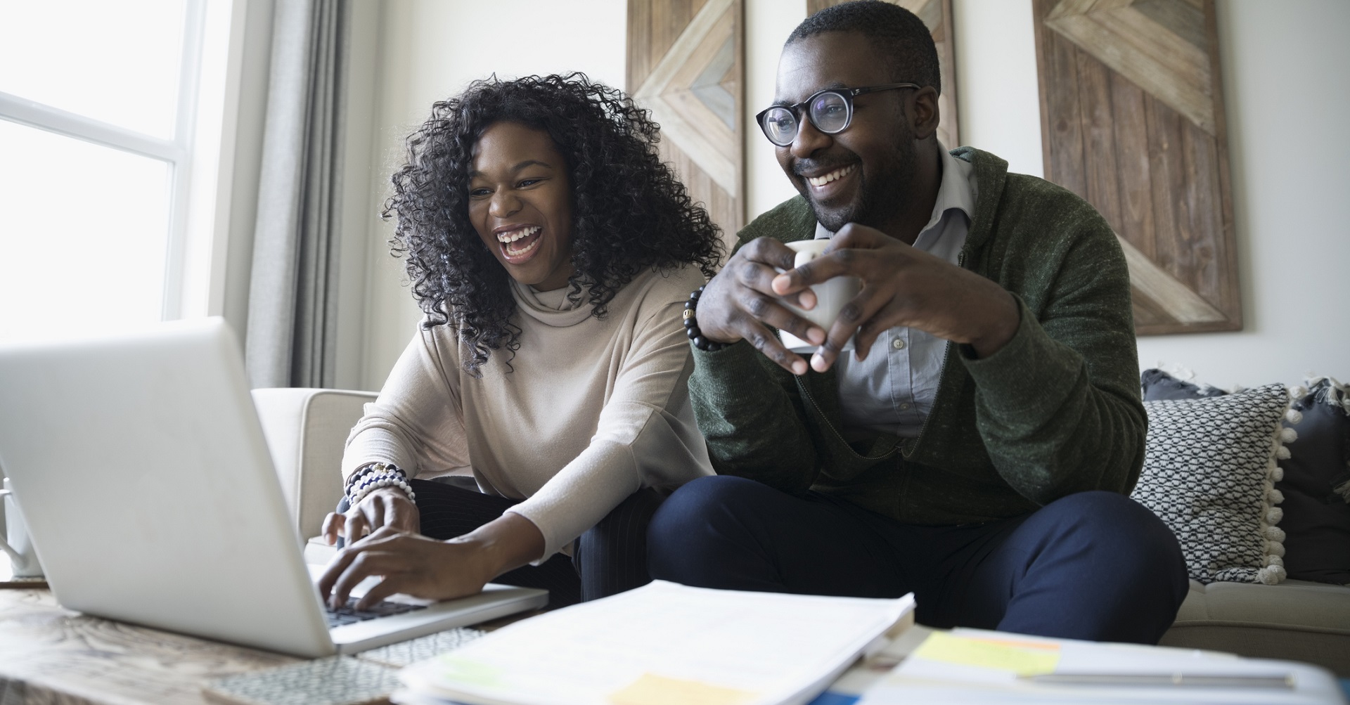 couple at home on laptop together