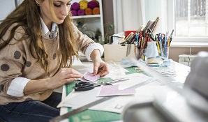 Woman making a vision board