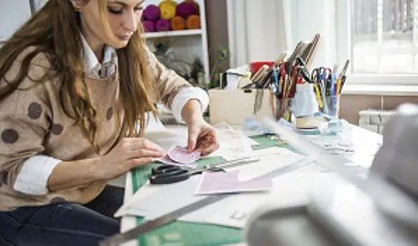 Woman making a vision board
