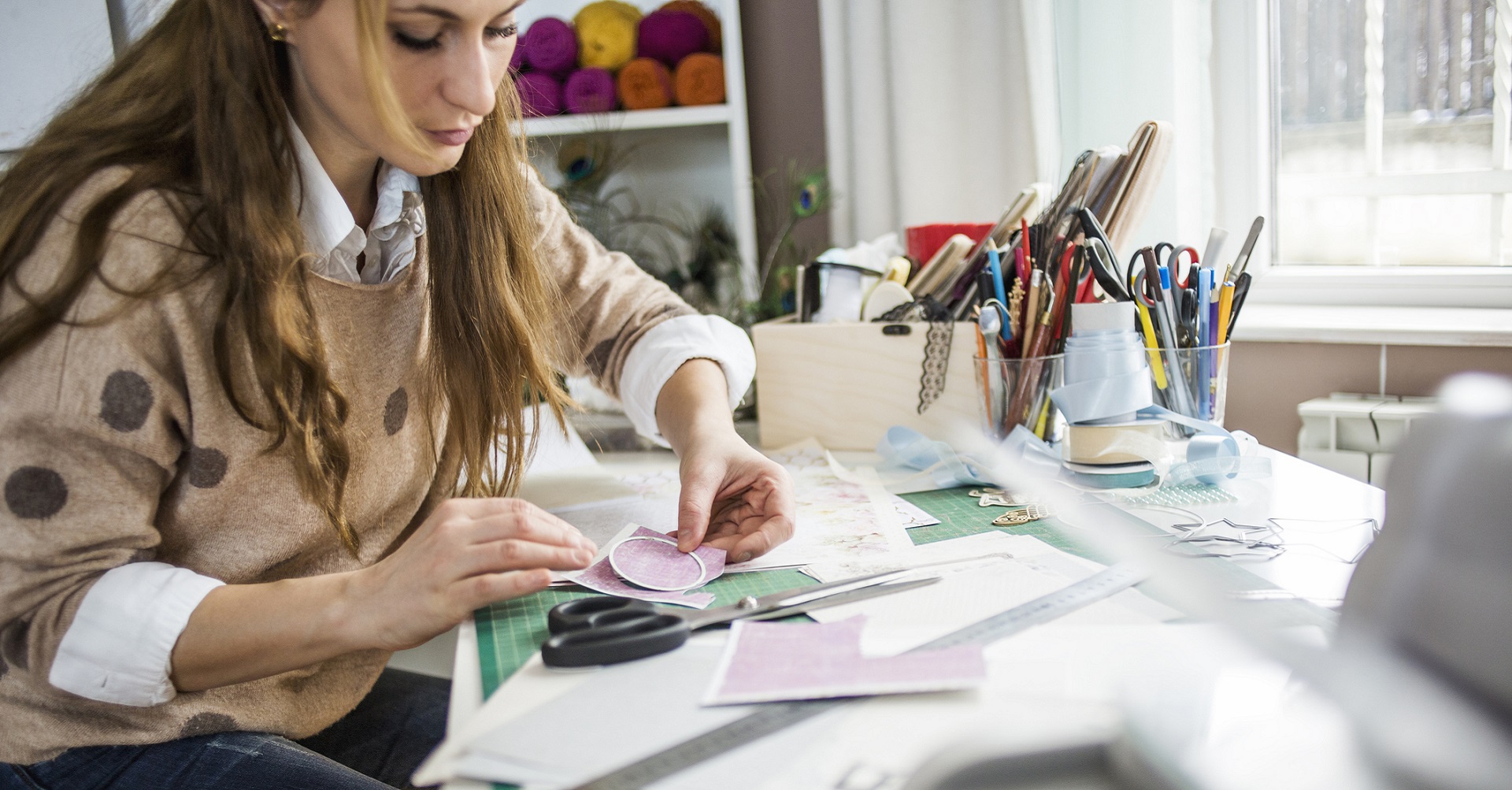 Woman making a vision board