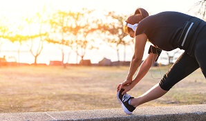 woman stretching before going for a run