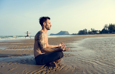 man doing yoga