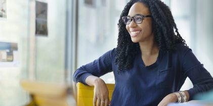 Woman wearing spectacles smiling