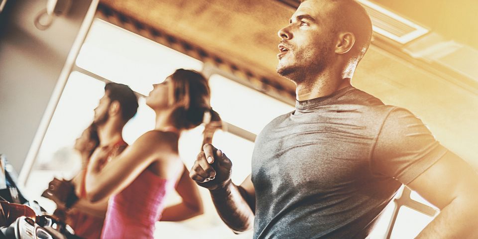 man running on treadmill