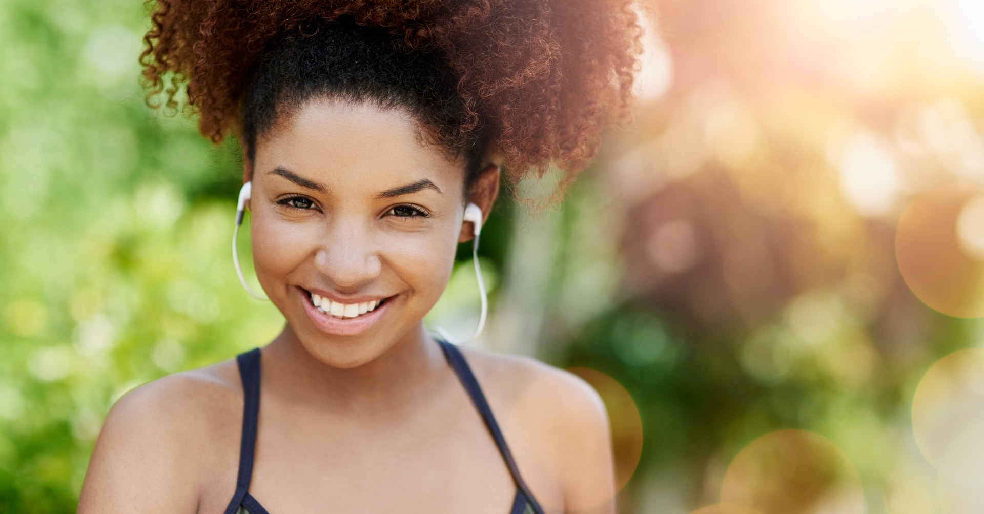 smiling woman about to go for a run