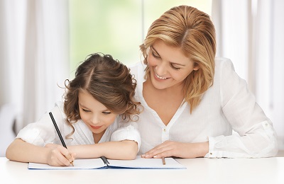 Mom helping kid with homework