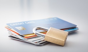 credit cards on table with padlock