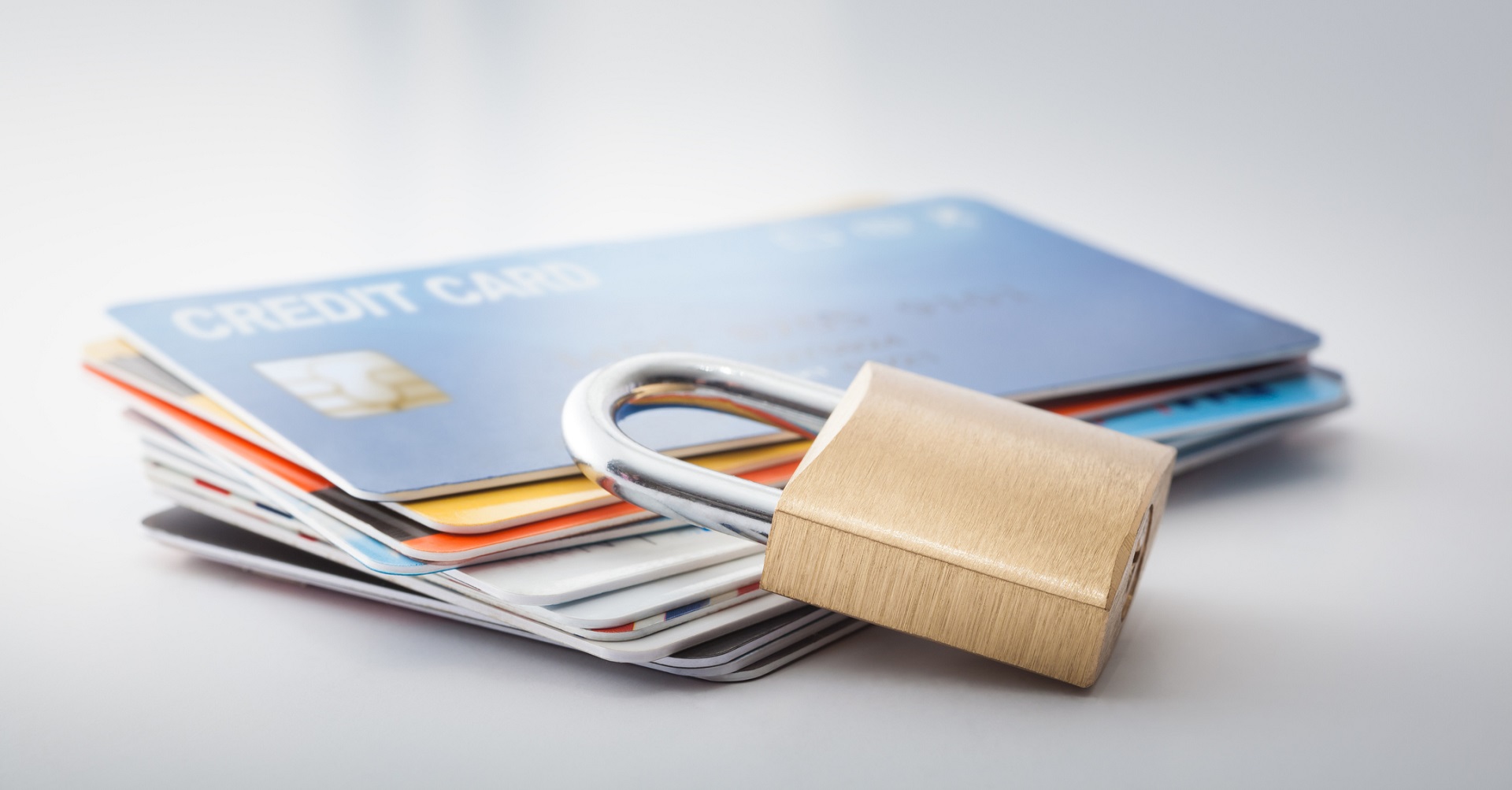 credit cards on table with padlock