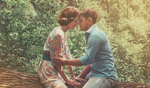 couple sitting on branch together