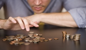 man counting coins