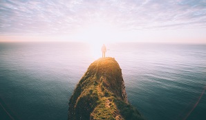 man standing on mountain