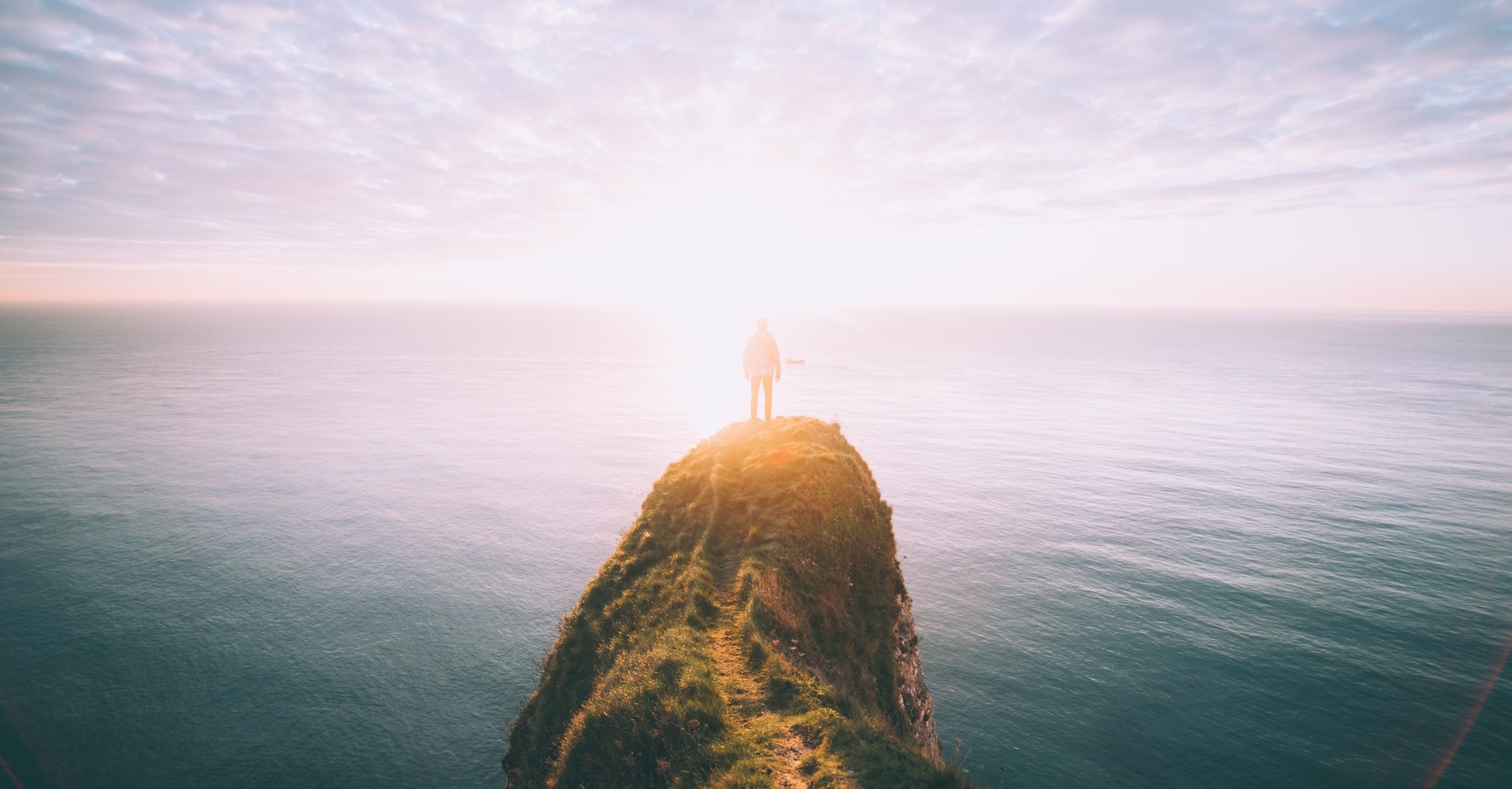 man standing on mountain